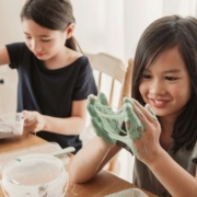 mixed Asian girl friends making slime, sensory craft, fun homeschool chemistry project