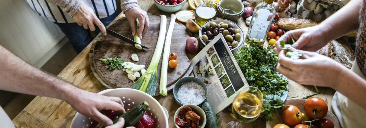 People cooking healthy food in the kitchen