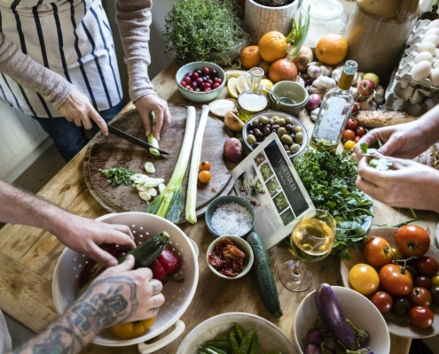 People cooking healthy food in the kitchen