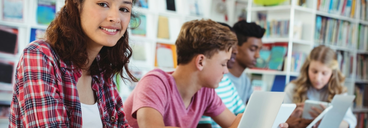 Students using laptop, digital tablet